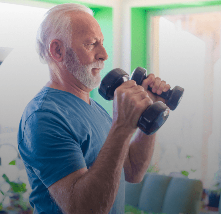 Older adult strength training with dumbbells