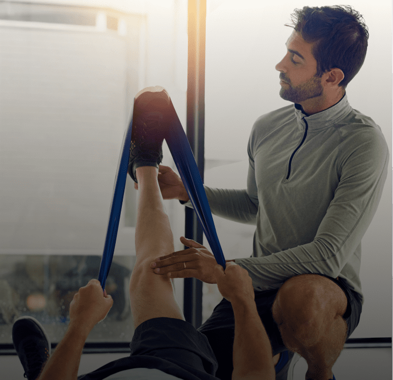 Rehabilitation session with leg stretching exercise